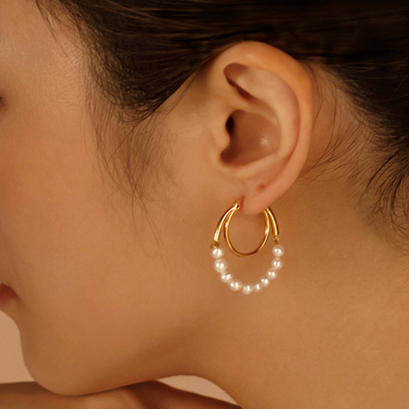 Elegantes pendientes de perlas para mujer en cobre